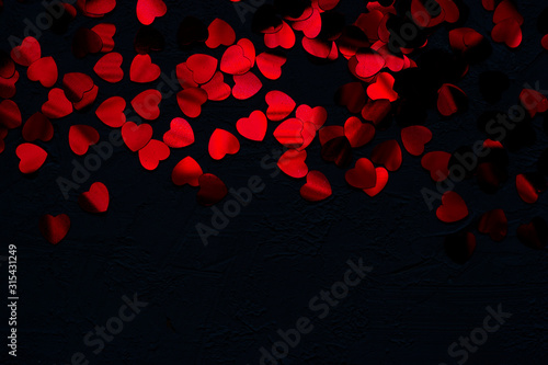 top view of red heart shape glitter background