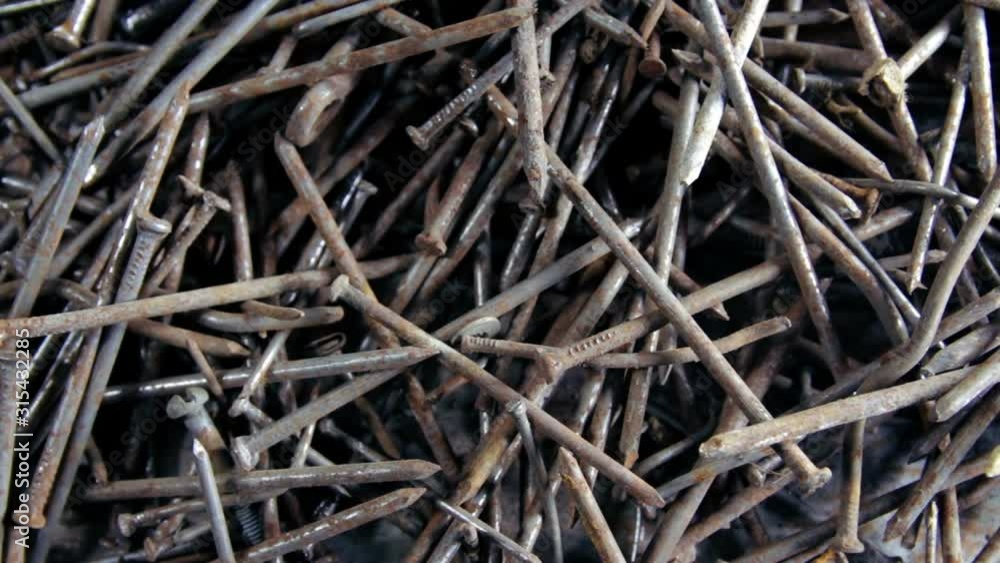 Rusty metal nails, screws, nuts, dowels, washers Rusty metal nails, screws, nuts, dowels, washers