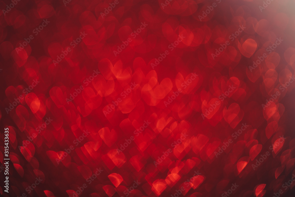 Fototapeta Valentine's day red background Hearts shape bokeh.