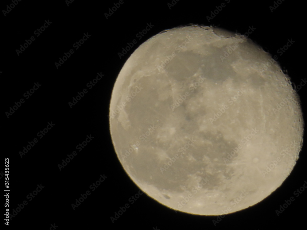 Moon With Clouds In The Night Sky. Concept of a spooky theme and mystery. Moon With Clouds In The Night Sky. Concept of a spooky theme and mystery.