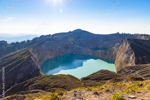 Kelimutu crater lake in the morning. Sunlights on the. Moni, Flores, Indonesia.