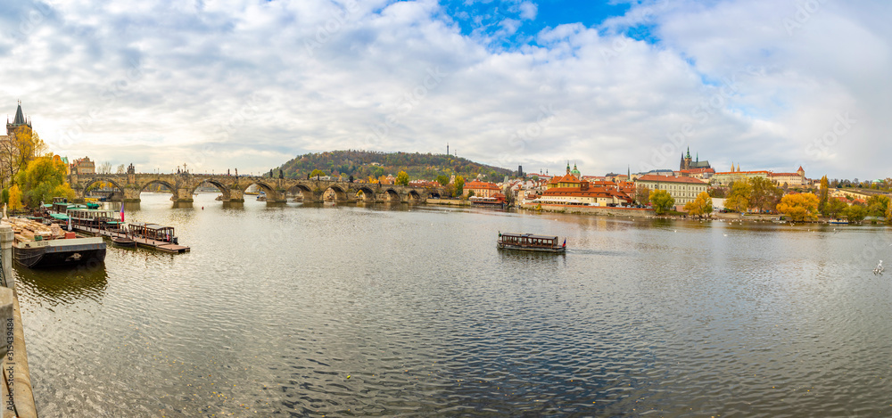 Panorama view of Prague Castle and Charles bridge over river Vltava in november day, Prague, Czech Republic