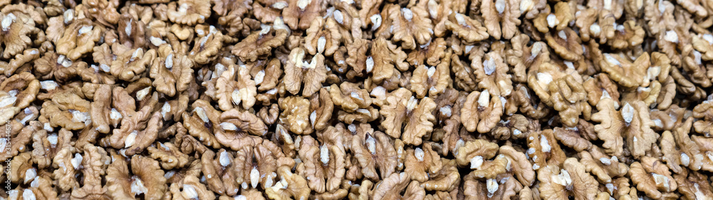 Walnuts shelled. Peeled Raw Walnuts. Fresh organic Nuts. Raw nuts. Many delicious Walnuts as a food background. Walnuts shelled. Peeled Raw Walnuts. Fresh organic Nuts. Raw nuts. Many delicious Walnuts as a food background.