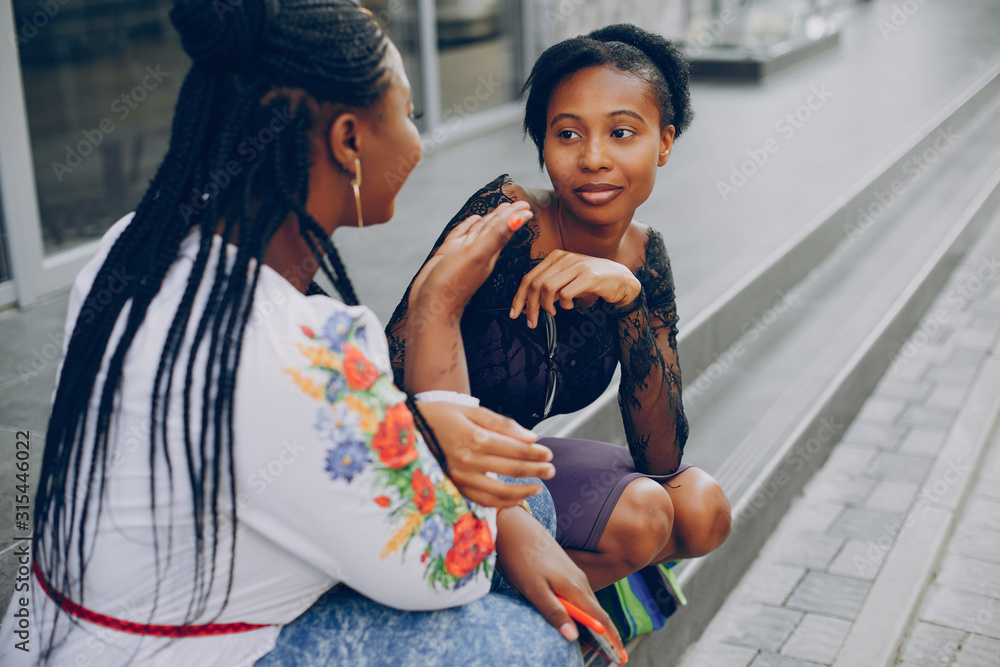 Girls on the street. Beautiful girls. Girls walk along the streets of the city Girls on the street. Beautiful girls. Girls walk along the streets of the city