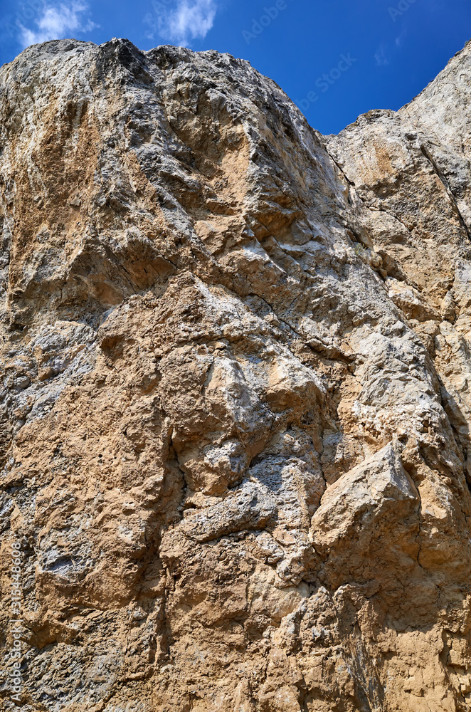 The rocky coast of the Black Sea. High stone rock. Cape Alchak in Sudak, Crimea