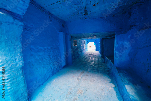 Morocco blue city corridor stretching into the distance and deserted © nelen.ru