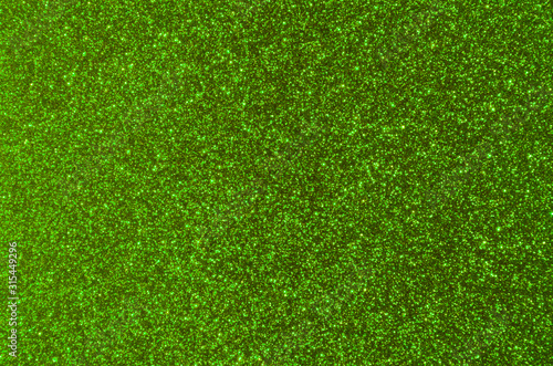 Bright trendy green background with glitter.