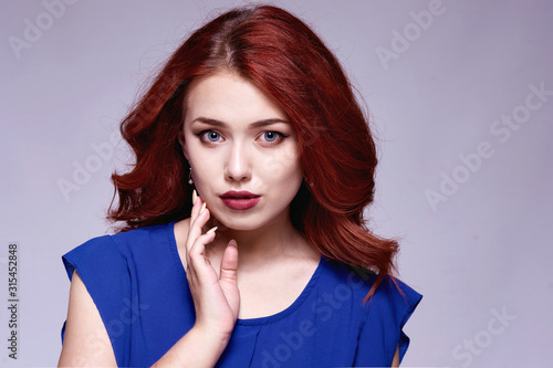 Woman with beauty long brown hair - posing at studio © Elena Kharichkina