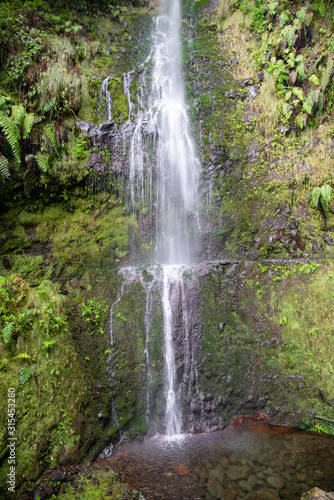 Caldeirao Verde waterfall at  the end of the hiking trail on the Levada Caldeirao Verde near Santana on the island of Madeira  Portugal.