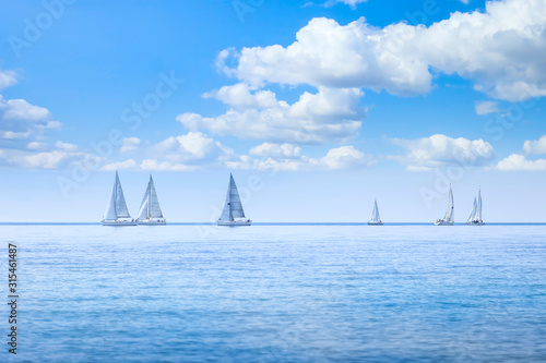 Sailing boat yacht regatta race on sea or ocean water
