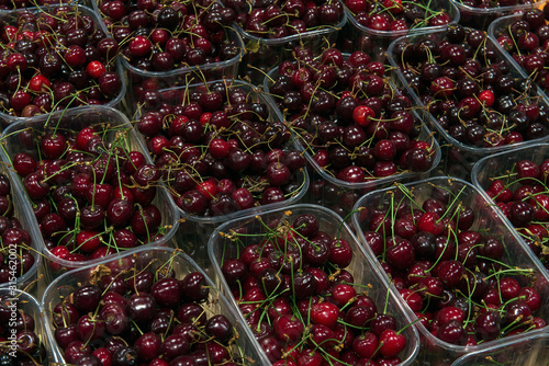 sale of sweet cherries in the grocery market