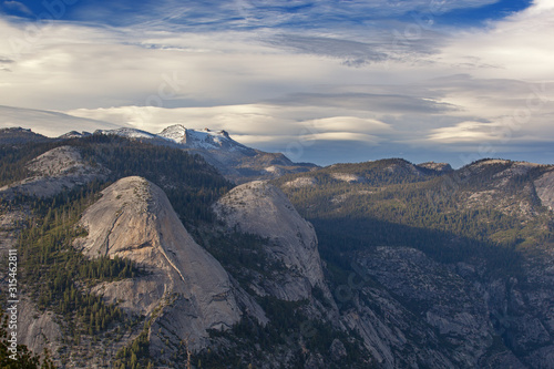 Landscape of the Sierra Nevada Mountains with beautiful clouds from Glacier Point, Yosemite National Park, California USA © Dean Pennala