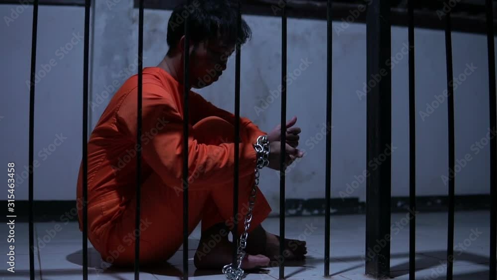 Prisoner in the iron prison,prisoner concept,thailand people,Hope to be free. Prisoner in the iron prison,prisoner concept,thailand people,Hope to be free.