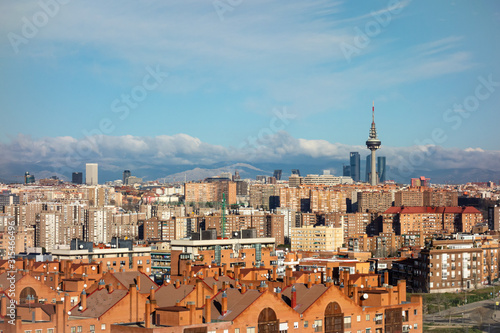 Skyline of the city of Madrid, on a day with blue sky and clouds, from the popular neighborhood of Vallecas