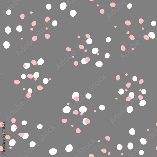 Simple girly seamless pattern with scattered round spots. Vector illustration.