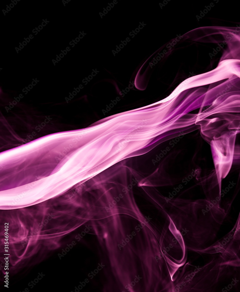 Fototapeta premium Purple smoke on black background