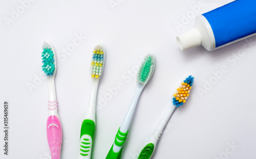 Various toothbrushes on a white background.