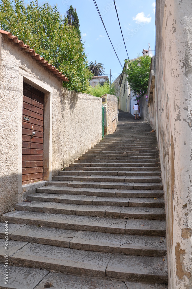 Climb with many shallow sone steps. City of Mali Losinj street
