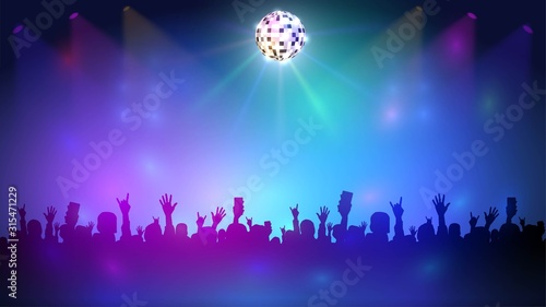 Night club with a crowd and disco ball, music event and dance