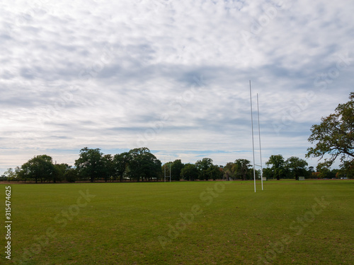 Outside sports field college university goal posts football rugby