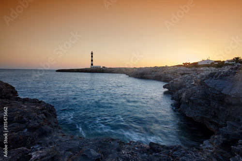 Wallpaper Mural Cap d'Artrutx Lighthouse, located in the extreme south-western point of the island adjacent to the larger resort of Cala en Bosch, Menorca,Balearic Islands, Spain Torontodigital.ca