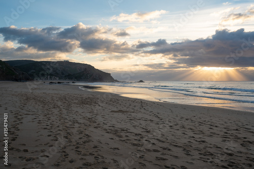 Praia do amado beach at sunset in Costa Vicentina  Portugal