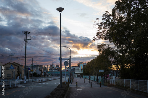 Higashikakogawa, Japan - January 10, 2020: Beautiful clouds and sunset in quiet Japanese town