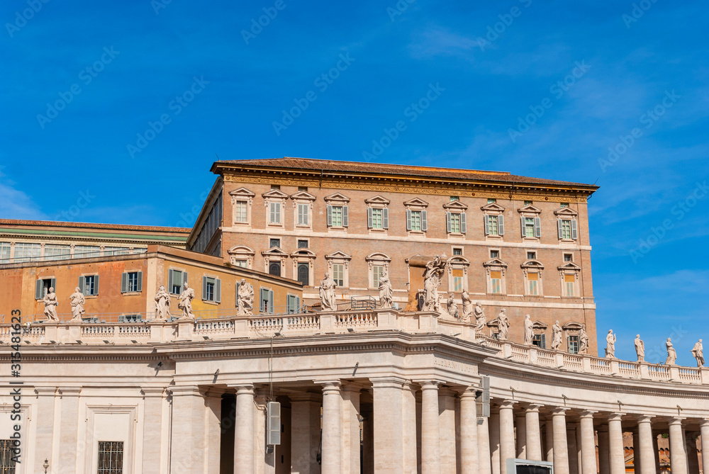 St Peter's Basilica on blue sky background. Vatican,