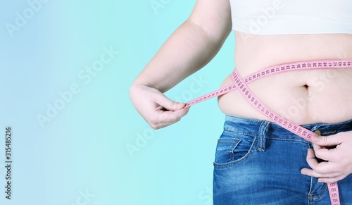 Female figure with measuring tape on pastel background