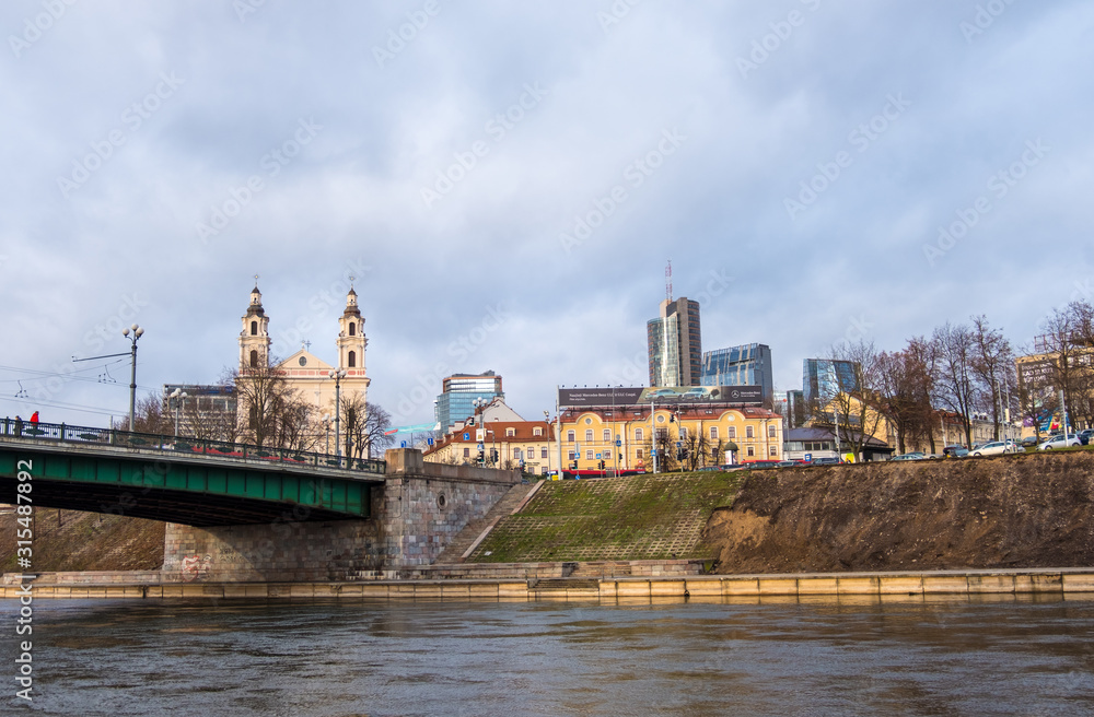 Neris River and view of the Old Town and the New City Center of Vilnius, Lithuania