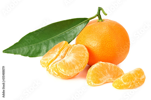 Wallpaper Mural mandarin with slices and green leaf isolated on white background Torontodigital.ca
