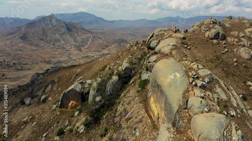 Aerial Drone Shot of Anja Community Reserve in Madagascar with Beautiful Grassy Mountain Woodlands with Fallen Rocks and Wildlife