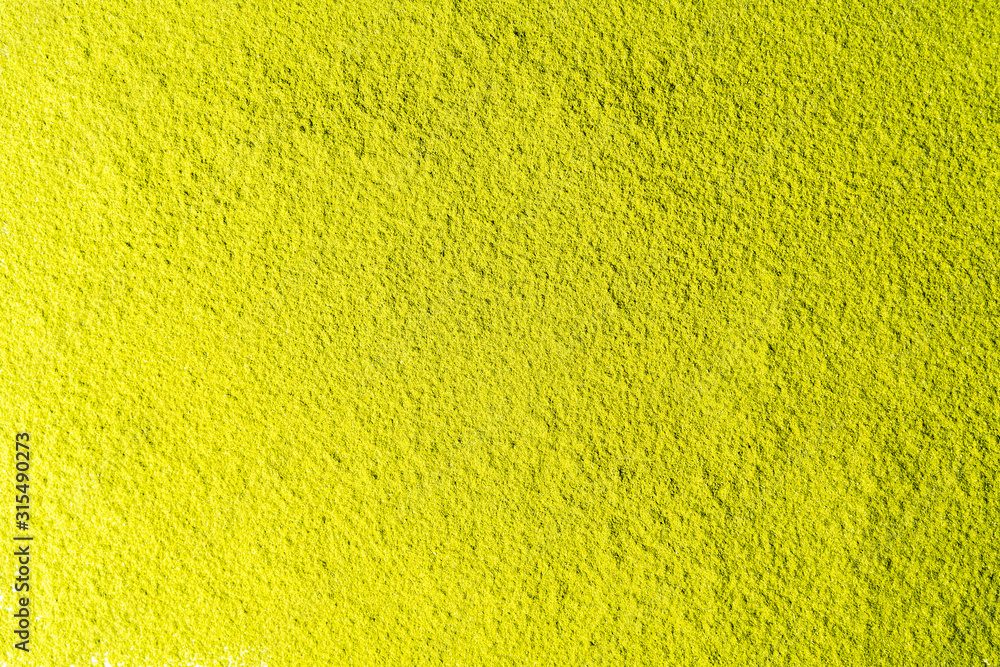 Top view of green tea matcha powder background. Top view of green tea matcha powder background.