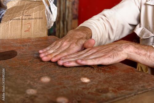 Making a cuban cigar in Viniales - Cuba