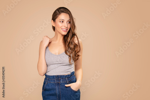 Young modern woman in trendy clothes.