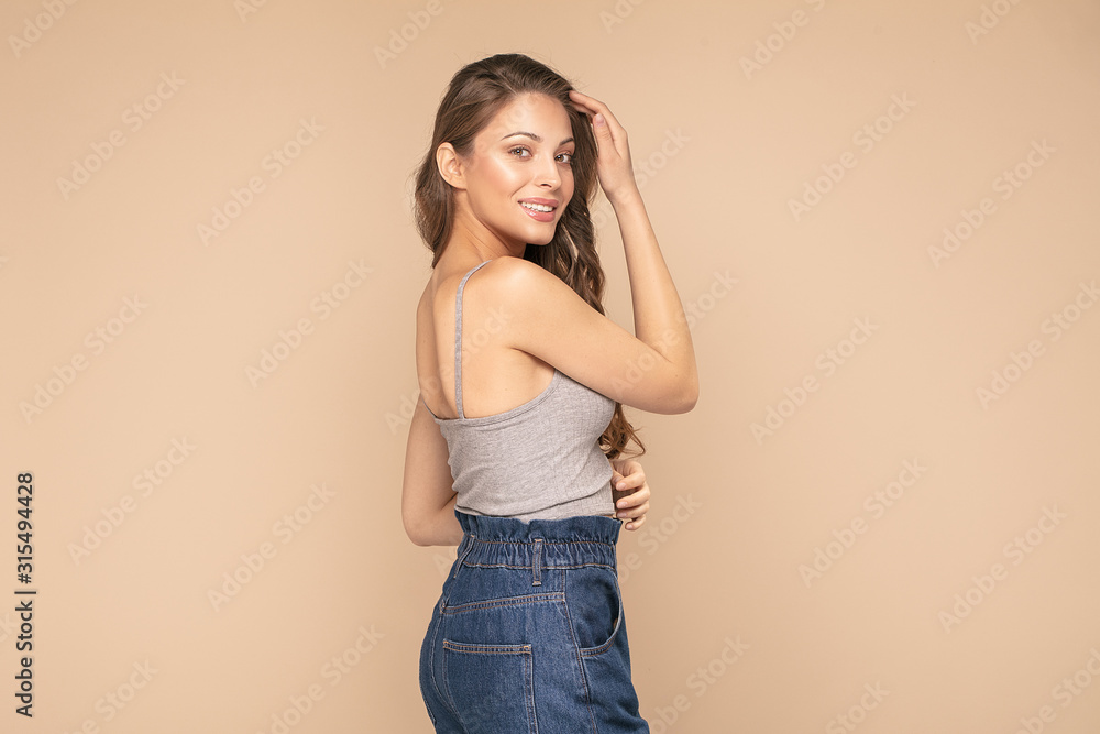 Young modern woman in trendy clothes. Young modern woman in trendy clothes.