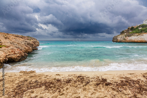 Rocky beach under a gloomy dramatic sky