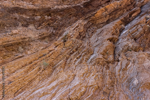 Layered stone formation in canyon of Death Valley