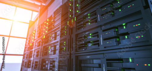 Obraz na płótnie Server units in cloud service data center showing flickering light indicators for massive data connection bandwidth, close up shot. w salonie