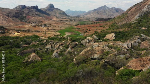 Aerial Drone Shot of Anja Community Reserve in Madagascar with Beautiful Grassy Mountain Woodlands with Fallen Rocks and Wildlife