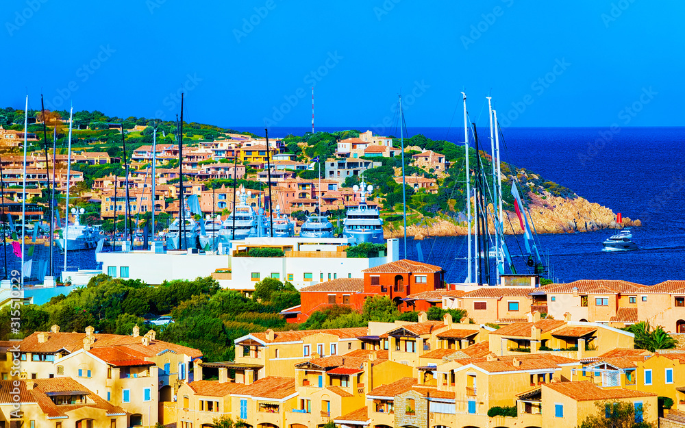 Obraz premium Scenery with Marina and luxury yachts at Mediterranean Sea of Porto Cervo in Sardinia Island of Italy in summer. Landscape View on Sardinian town port with ships and boats in Sardegna. Mixed media.