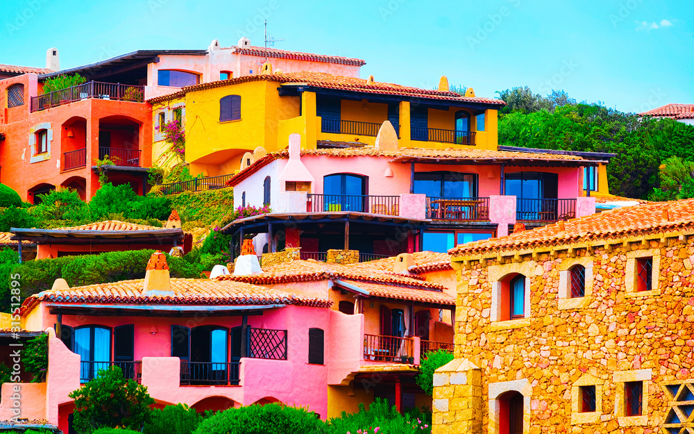 Cottage and scenery in Porto Cervo on Sardinia Island of Italy in summer. Villa and Landscape View on Sardinian town in Sardegna. Olbia province. Mixed media.