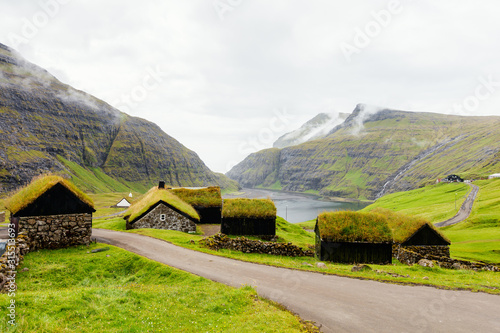 Fototapeta Houses with grass roof in Faroe islands