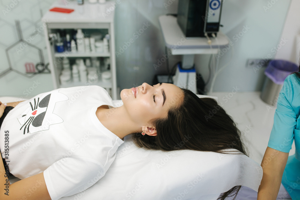 Young girl at Cosmetic Beauty Spa Clinic waiting for beauty procedure Young girl at Cosmetic Beauty Spa Clinic waiting for beauty procedure