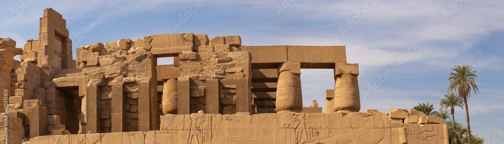 Luxor Governorate, Egypt, Karnak Temple, complex of Amun-Re. Embossed hieroglyphics on columns and walls. The third pylon.