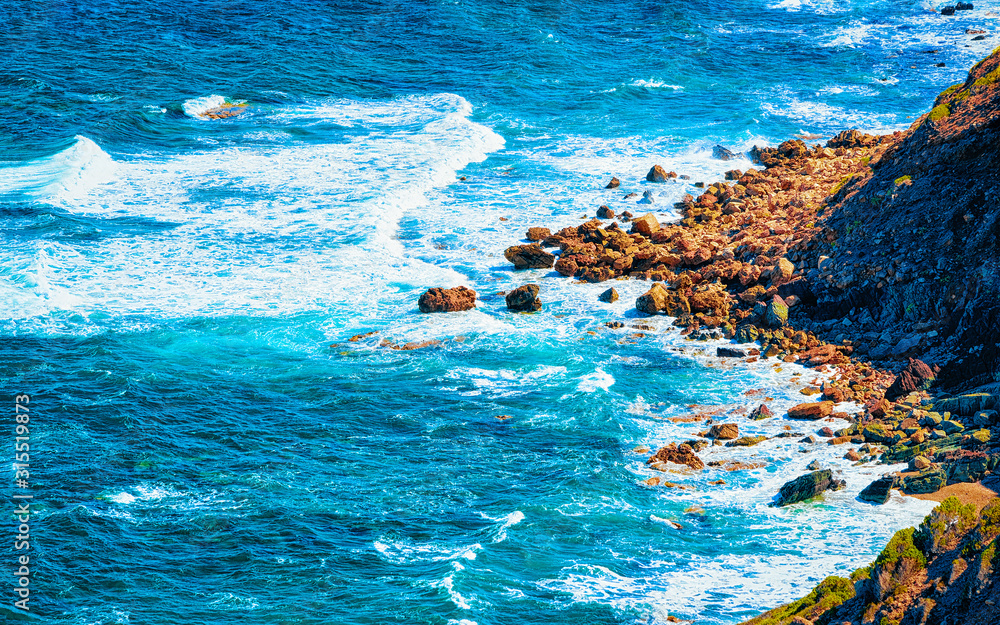 Landscape at Porto Corallo in Nebida and the coast of