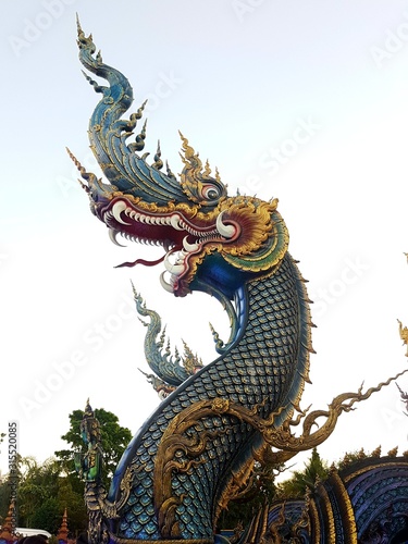 chinese dragon on the roof of thai temple