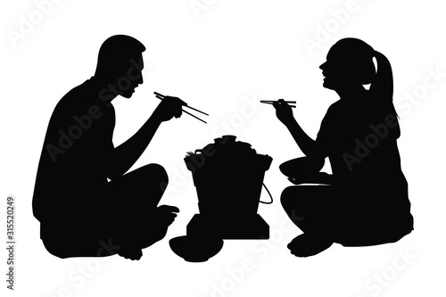 A man and a woman in party with pork grilled pan silhouette vector