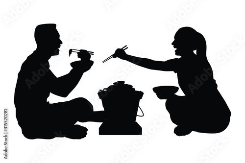 A man and a woman in party with pork grilled pan silhouette vector