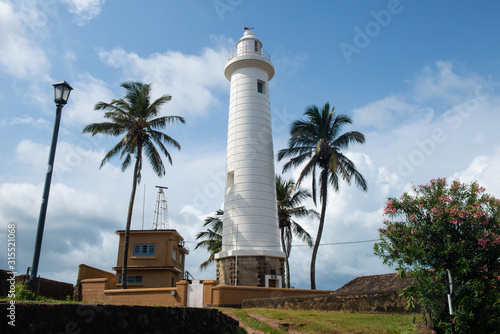 Galle Lighthouse in Galle fort or Dutch Fort one of UNESCO world heritage site in southwest coast of Sri Lanka. Lighthouse are to serve as a navigational aid and to warn boats of dangerous areas. © boyloso